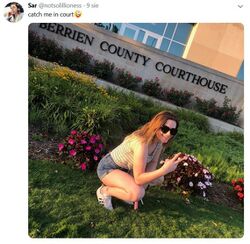 September 9, 2019 social media post showing Sarah smiling outside the Berrien County Courthouse with the caption "catch me in court" with a goofy face emoji.