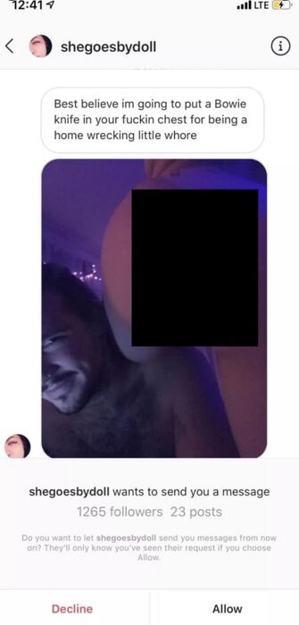 Instagram message from the account shegoesbydoll threatening to put a Bowie knife into another woman’s chest and calling her a home-wrecker.